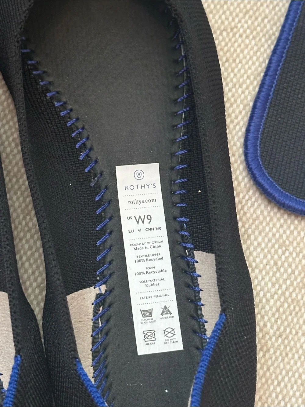 Rothy's Black Pointed Knit Flats with Blue Heel Trim